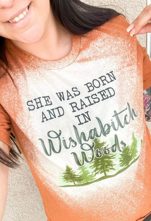 She Was Born and Raised in Wishabitch Woods Graphic Tee